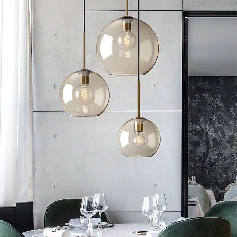 Suspension Luminaire Design Boule Verre Ambré Cognac & Laiton Doré